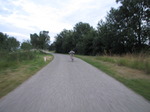 SX15530 Jenni riding her bike back to the campervan.jpg